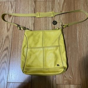The Sak Purse with adjustable strap for crossbody or shoulder wear